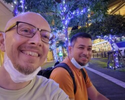 Heinz Tessner and Joel Castasus enjoy the night lights in Naha.